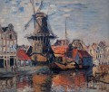 The Windmill on the Onbekende Canal Amsterdam 1874 Claude Monet
